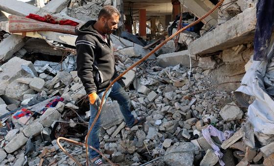 Sufyan Al-Majdalawi inspects the rubble of his home in Jabalia in northern Gaza. 