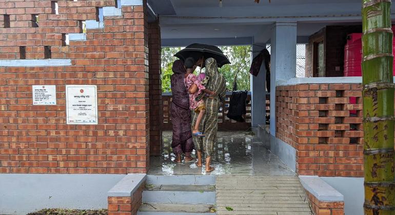 In a home built in collaboration with UNEP, villagers took refuge in Bangladesh during the cyclone Rimal in 2021.