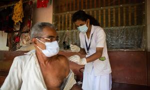 ANM, Health worker Deepa vaccinating people in far-flung villages.