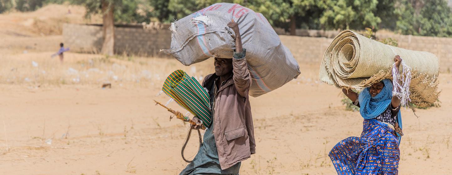 Aid is distributed to displaced families who fled violence in Nigeria and have settled in Niger.