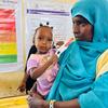 Mothers bring their children for nutrition screening at a mobile health clinic in Kassala state, Sudan.