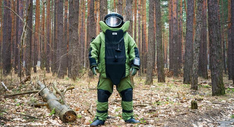 An Explosive Ordnance Disposal Specialist works in Ukraine to clear land of contamination from the war. An Explosive Ordnance Disposal Specialist works in Ukraine to clear land of contamination from the war.