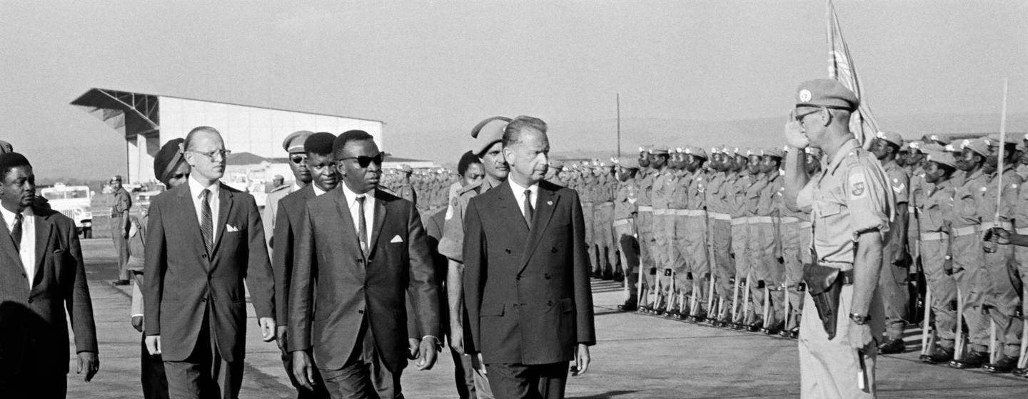 UN Secretary-General Dag Hammarskjöld arrived in Leopoldville on 13 September 1961, upon invitation of Premier Cyrille Adoula, to discuss support to the Republic of the Congo. At his side is Premier Adoula.