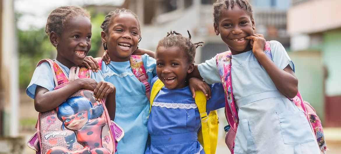 Young girls walk home from school in São Tomé and Príncipe.
