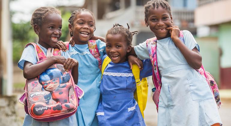 Young girls walk home from school in São Tomé and Príncipe.