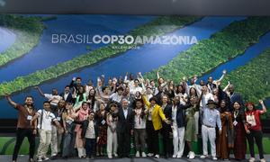 Participants during UN Secretary-General António Guterres's Youth Roundtable at COP30 in Belém, Brazil.
