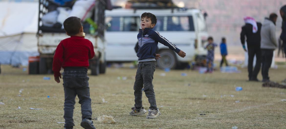 Two boys play at a reception centre in Raqqa city in northern Syria. Their families recently returned to the country.