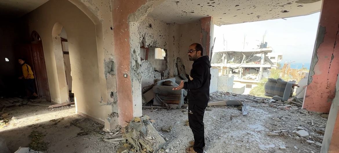 Shadi Jomaa Abu Sheha inside what's left of his home in north of Nuseirat, Gaza.