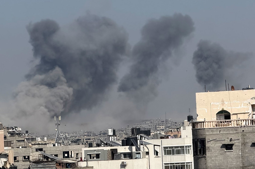 Smoke from explosions rises from the Shujaia neighborhood of Gaza City. Smoke from explosions rises from the Shujaia neighborhood of Gaza City.