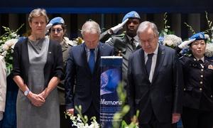 The UN Secretary-General António Guterres (right) honours the memory of UN personnel who lost their lives in the line of service in 2022.