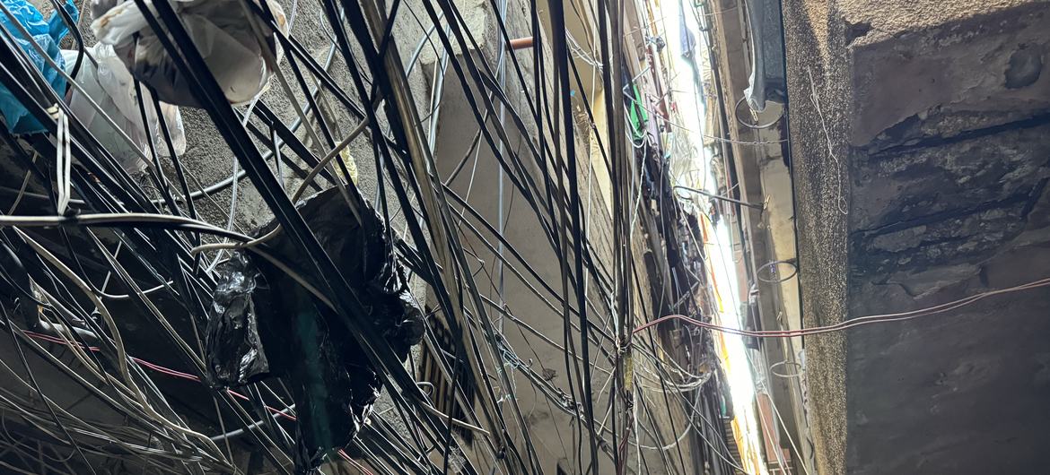 Electrical wires form a web for rats to climb into apartments in Al Biddawi refugee camp.