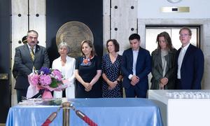 Survivors and families of the victims of the attack against the UN Offices in Baghdad of 19 August 2003 lay flowers during the Commemoration Ceremony of the World Humanitarian Day 2025 in Geneva.
