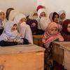 A group of elementary school girls sit in their classroom at a high school in Nuristan Province, Afghanistan.