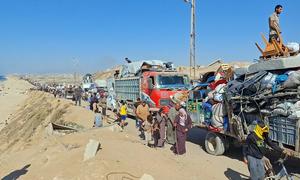 Hundreds of Palestinian families continued to flee Gaza City in the north of the enclave via the overcrowded coastal al-Rashid Street, amid a severe shortage of transportation and soaring travel costs, as Israeli military operations persist in the city.