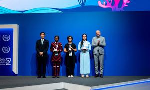 Fifteen-year-old Reyyan Demiriz from Türkiye (centre), has taken first prize in the 54th International Letter-Writing Competition for Young People, organised by the Universal Postal Union.