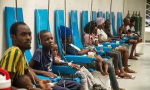 People exhibiting cholera symptoms receive treatment at the Centres Gheskio in Port-au-Prince, Haiti.