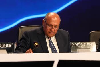 The President of COP27, Egypt’s Foreign Minister Sameh Shoukry, gavels the adoption of the Parties decision to establish a 'loss and damage' funding mechanism.