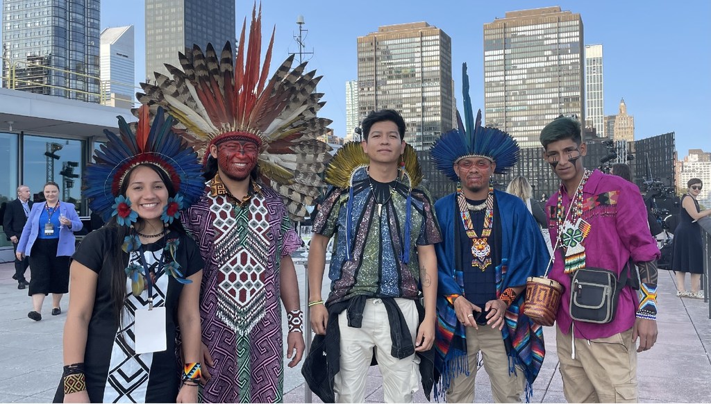 Indigenous Brazilians in traditional regalia at the United Nations headquarters in New York.