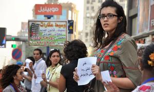 Activists protest against sexual harassment faced by women living in Cairo, Egypt.