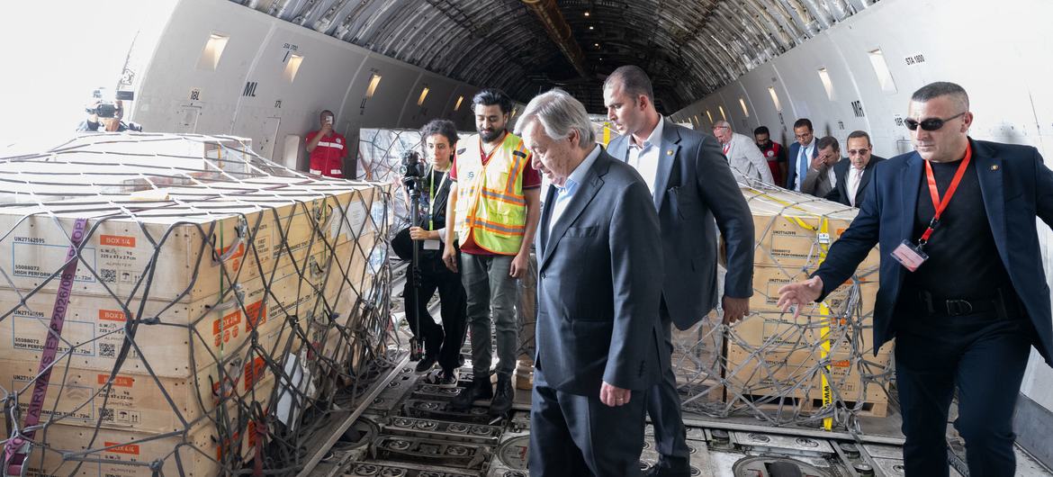 UN Secretary-General António Guterres inspects aid supplies in a cargo plane destined for the people of Gaza.