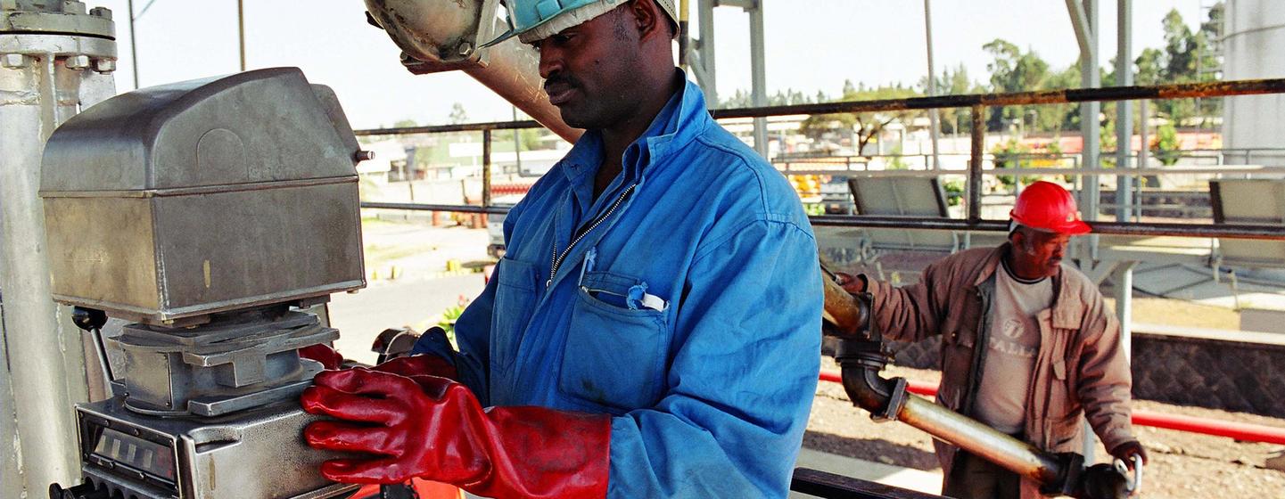 Workers undertake tasks at an industrial plant in Ethiopia.