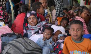 Families fleeing conflict in Sudan arrive at a transit centre in Aweil, South Sudan.