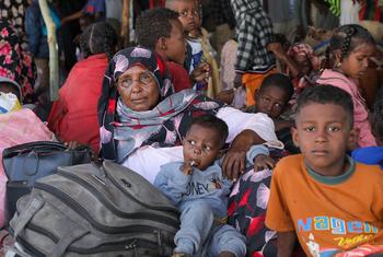 Families fleeing conflict in Sudan arrive at a transit centre in Aweil, South Sudan.