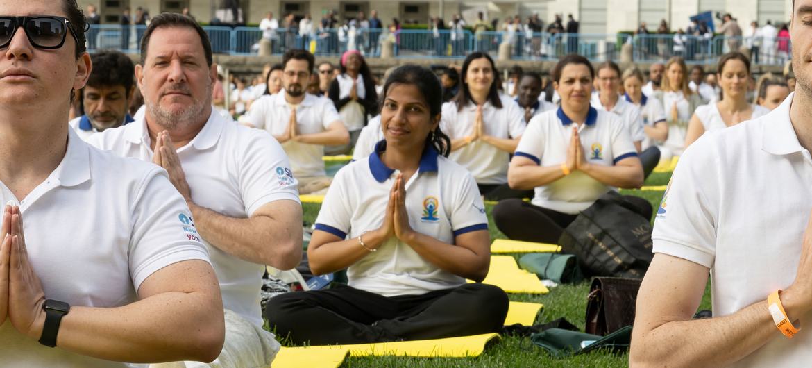 Participants join an event at UN Headquarters in New York to mark the 9th International Day of Yoga.