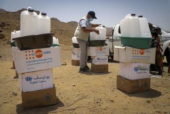 Rations are prepared for distribution to displaced people in Marib, Yemen.
