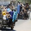 Families evacuate from Deir Al -Balah in the Gaza Strip