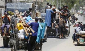 Families evacuate from Deir Al -Balah in the Gaza Strip