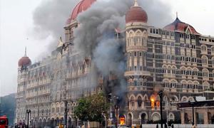 A view of the Taj Mahal Palace hotel in Mumbai during the targeted 2008 terror attacks on the Indian city.