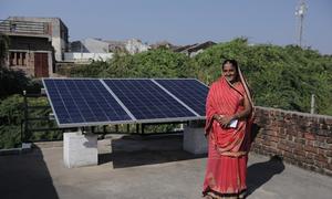 Gadvi Kailashben, a 42-year-old widow, lives in Modhera, India's first solar-powered village.  She said the solar panels installed on her home have provided much-needed relief from household expenses. 