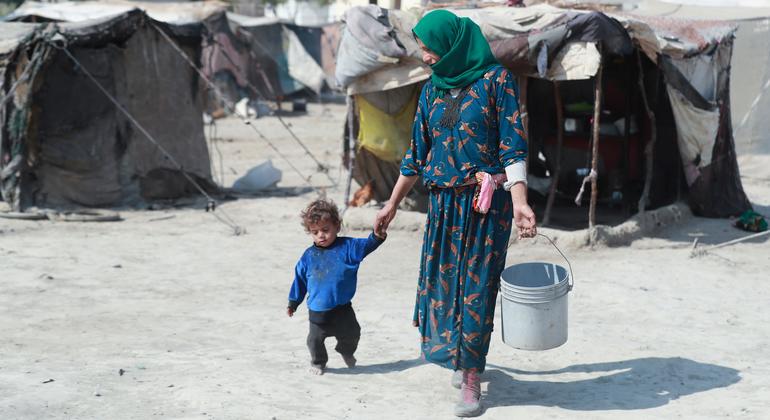 A family lives in an informal settlement in the city of Raqqa, northeastern Syria.