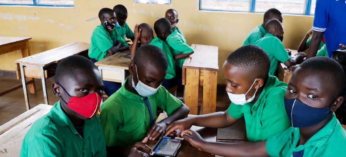 Children masked to protect them from COVID-19 infection, studying at a school in Kayonza District in Eastern Rwanda.