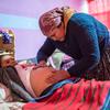 A pregnant woman in Guatemala receives care from a health worker.