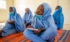 Medina, 16, attends class in a space set up by Save the Children at Dalori camp, Maiduguri, Save the Children set up spaces and services for vulnerable children in communities and camps for displaced people across Nigeria.