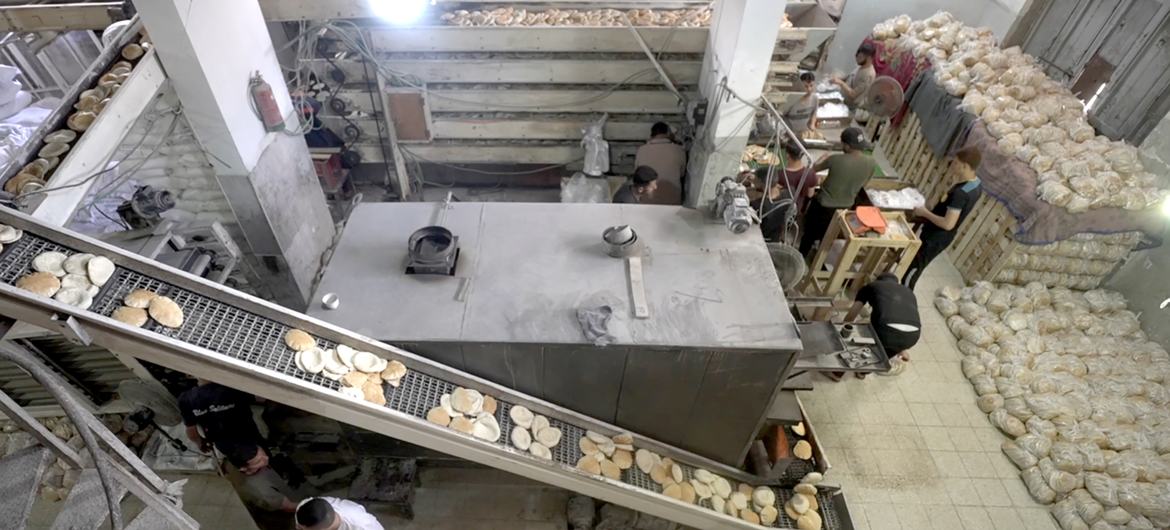 Al-Banna Bakery resumes bread production after more than 40 days of waiting for a flour delivery in Deir al-Balah, central Gaza Strip. Al-Banna Bakery resumes bread production after more than 40 days of waiting for a flour delivery in Deir al-Balah, central Gaza Strip.