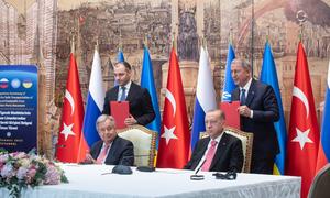 Secretary-General António Guterres (left) and President Recep Tayyip Erdoğan at the signing ceremony for the Black Sea Grain Initiative in Istanbul, Türkiye, on 22 July 2022.