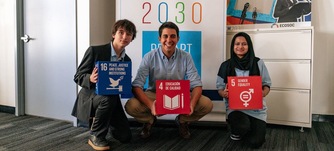 UN Assistant Secretary-General for Youth Affairs Felipe Paullier (center) meets with New York City school students Fariha Akter (right) and Erik Ponomarev.