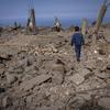 A 5-year-old boy walks through destroyed buildings in Majdal Zoun, southern Lebanon. (file)