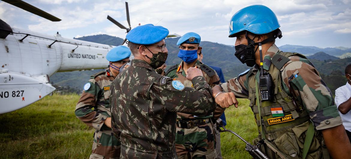 MONUSCO peacekeepers greet each other on a trip to North Kivu province in the eastern Democratic Republic of the Congo.