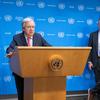Secretary-General António Guterres (at podium) briefs reporters on the situation in Gaza. At right is Stéphane Dujarric, Spokesperson for the Secretary-General.