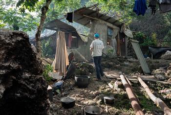 A UNICEF water and sanitation (WASH) specialist inspects the damage caused by the earthquake in Mele Maat village, about 10 kilometres northwest of Port Vila, the capital of Vanuatu.