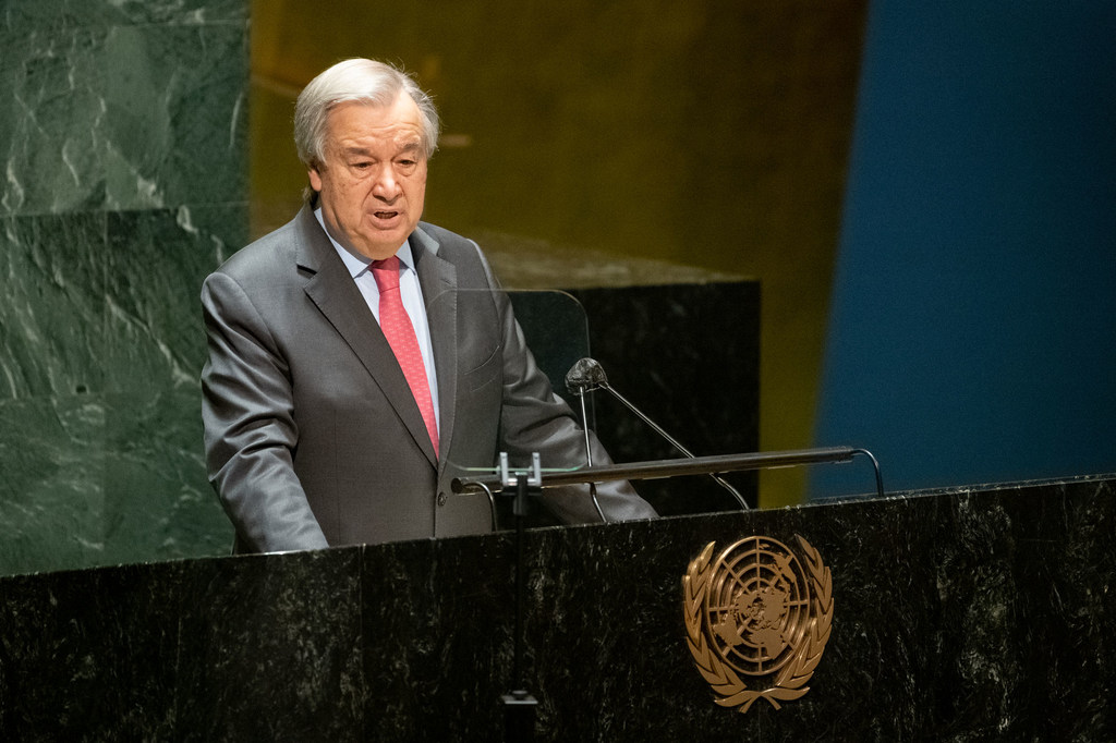 UN Secretary-General António Guterres speaks at a podium during a UN General Assembly meeting in New York.
