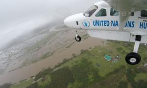 A UN Humanitarian Air Service (UNHAS) plane flies over cyclone-battered Nosy Varika, in  Madagascar.