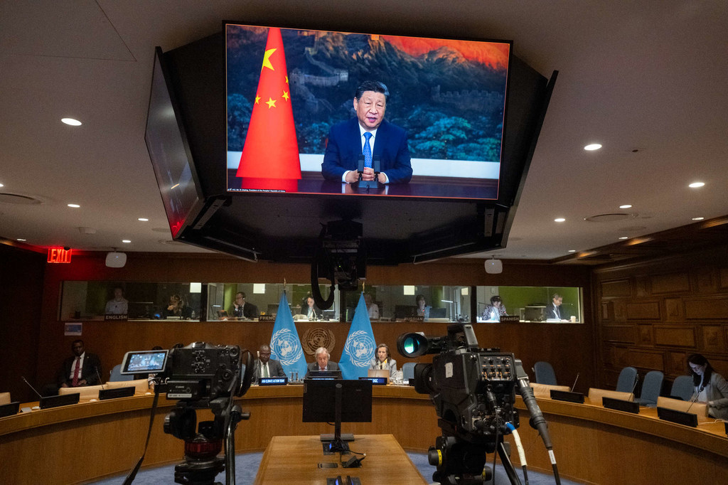 Le président chinois, Xi Jinping (à l'écran), lors du sommet virtuel des dirigeants mondiaux sur l'action climatique.