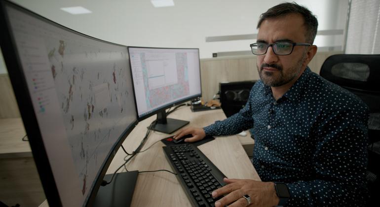 UNODC’s Ahmed Esmati analysing satellite imagery of Afghanistan from his office in Tashkent.