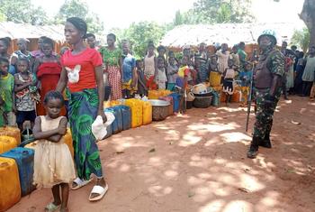 The villagers of Bisa are in a line ready to get clean and safe water facilitated by the United Nations peacekeepers from Tanzania under MINUSCA in the Central African Republic, distributed by means of vehicles.