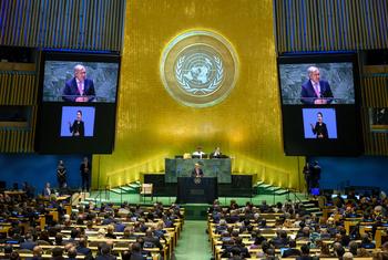 Un Secretary-General António Guterres (at podium and) addresses the opening of the Summit of the Future.